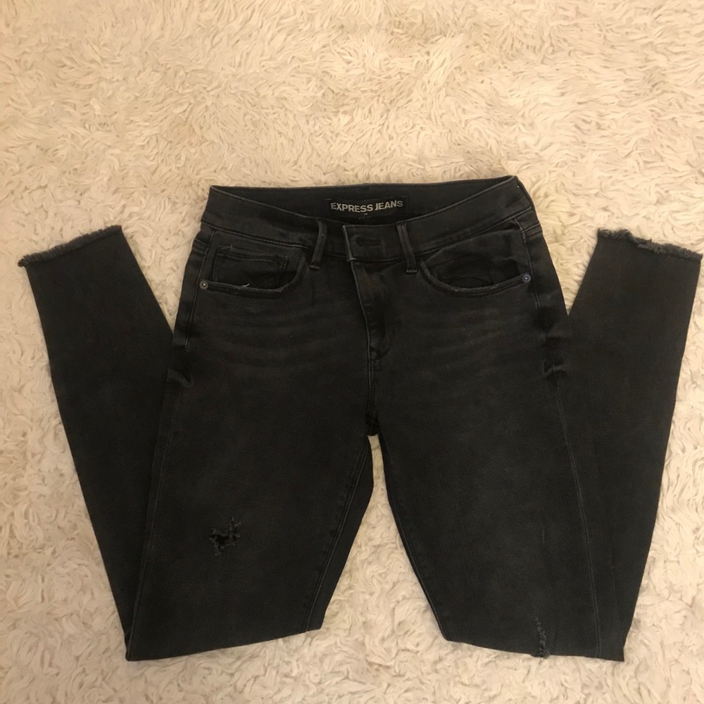 Express raw hem skinny jeans
